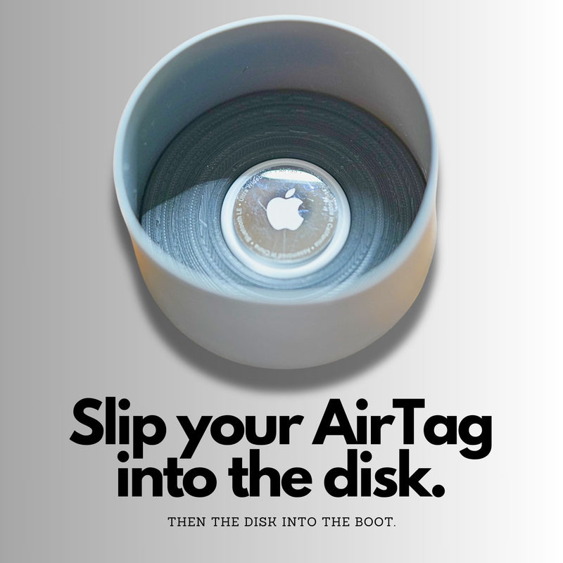 An AirTag Hydrodisk sits inside of a Hydro Flask Boot to help user track location of water bottle.